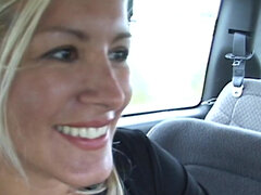 Busty MILF lets herself be fucked by a stranger in car POV