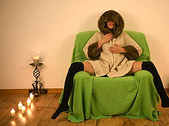 2 climaxes sitting on the chair with buttplug