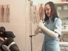 Dominant nurse engages in BDSM play with her submissive patient