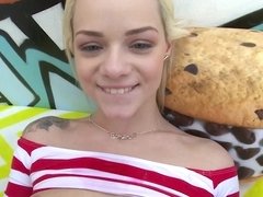 A big ass blonde gets oiled up and then kissed in her pussy