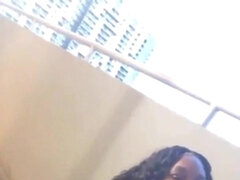 Big Tits Ebony Sucks BBC in a Public Balcony