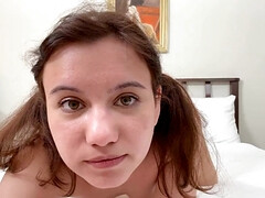 Pigtailed teen girl shows off her oral skills and beyond