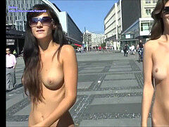 femmes walk naked thru the city streets