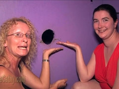 GILF Cathy and her sexmate wait for gloryhole dicks