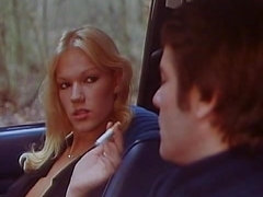 Blonde Brigitte Lahaie sits into the car to ride a dick